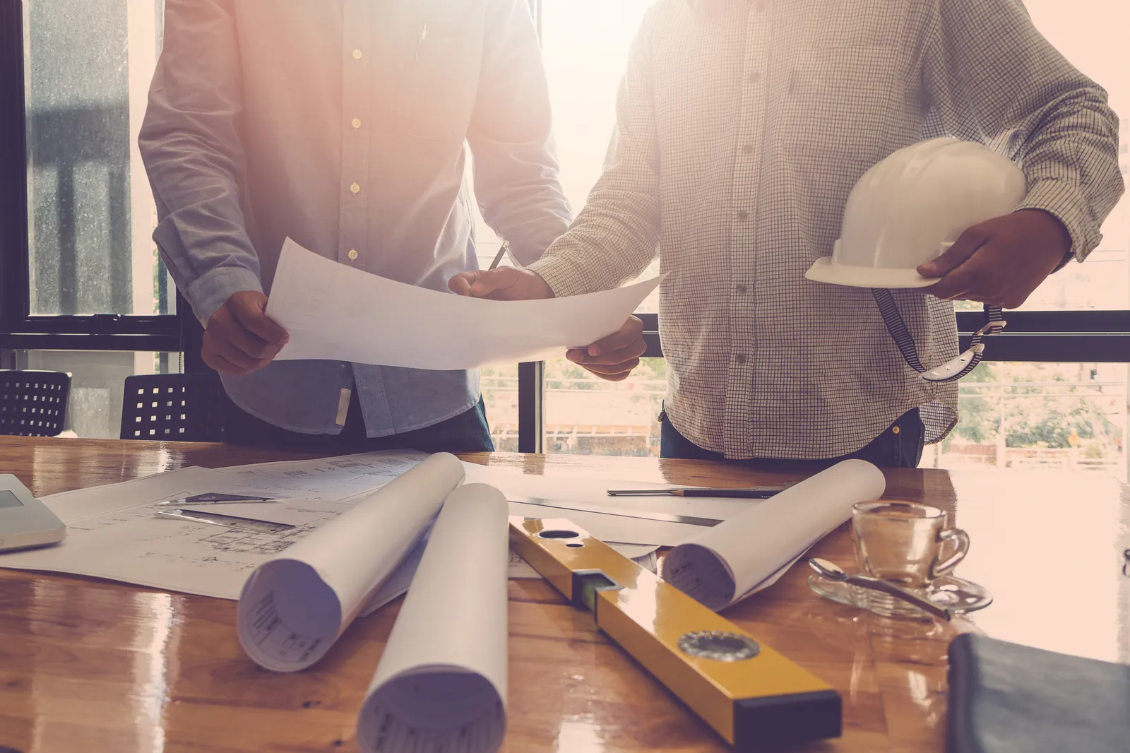 Architect,Concept,,Architects,Working,With,Blueprints,In,The,Office,,Vintage