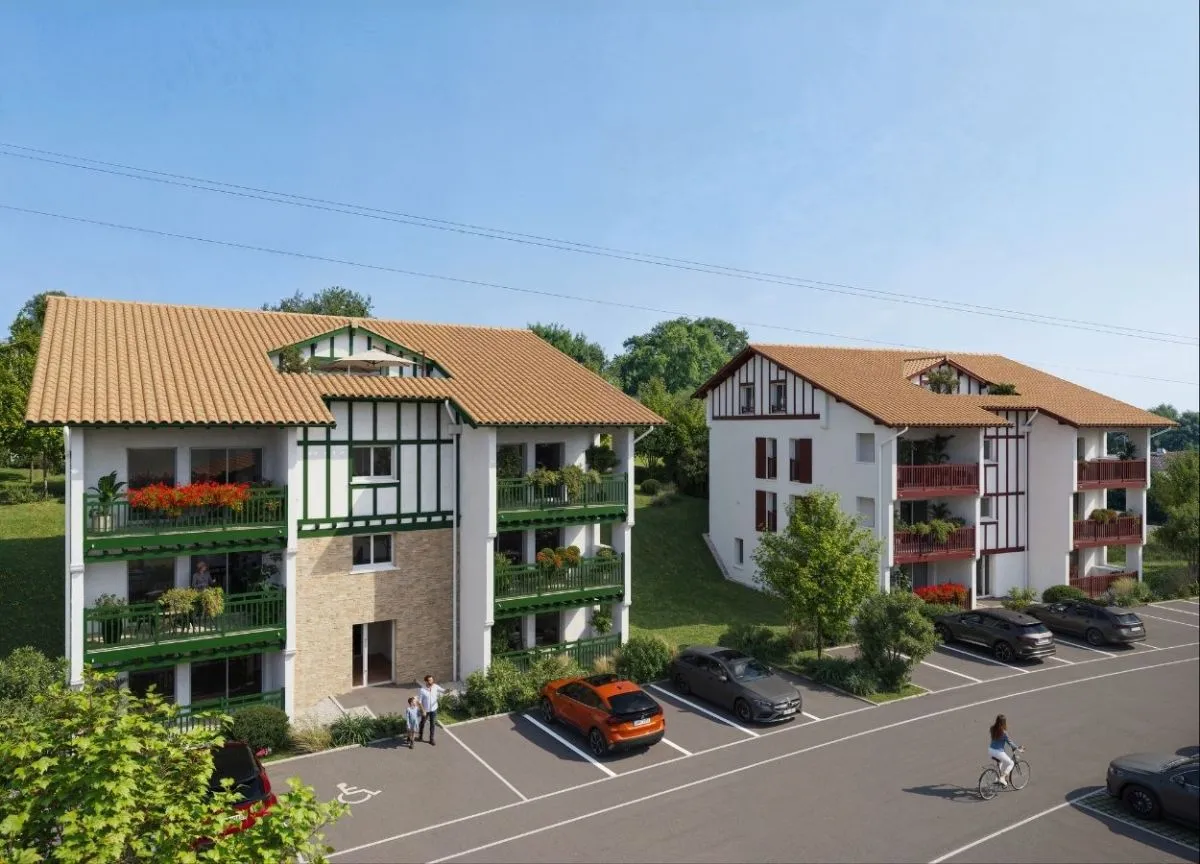 Vue 3D des bâtiments collectifs du programme, présentant les appartements, les façades et les espaces extérieurs communs.